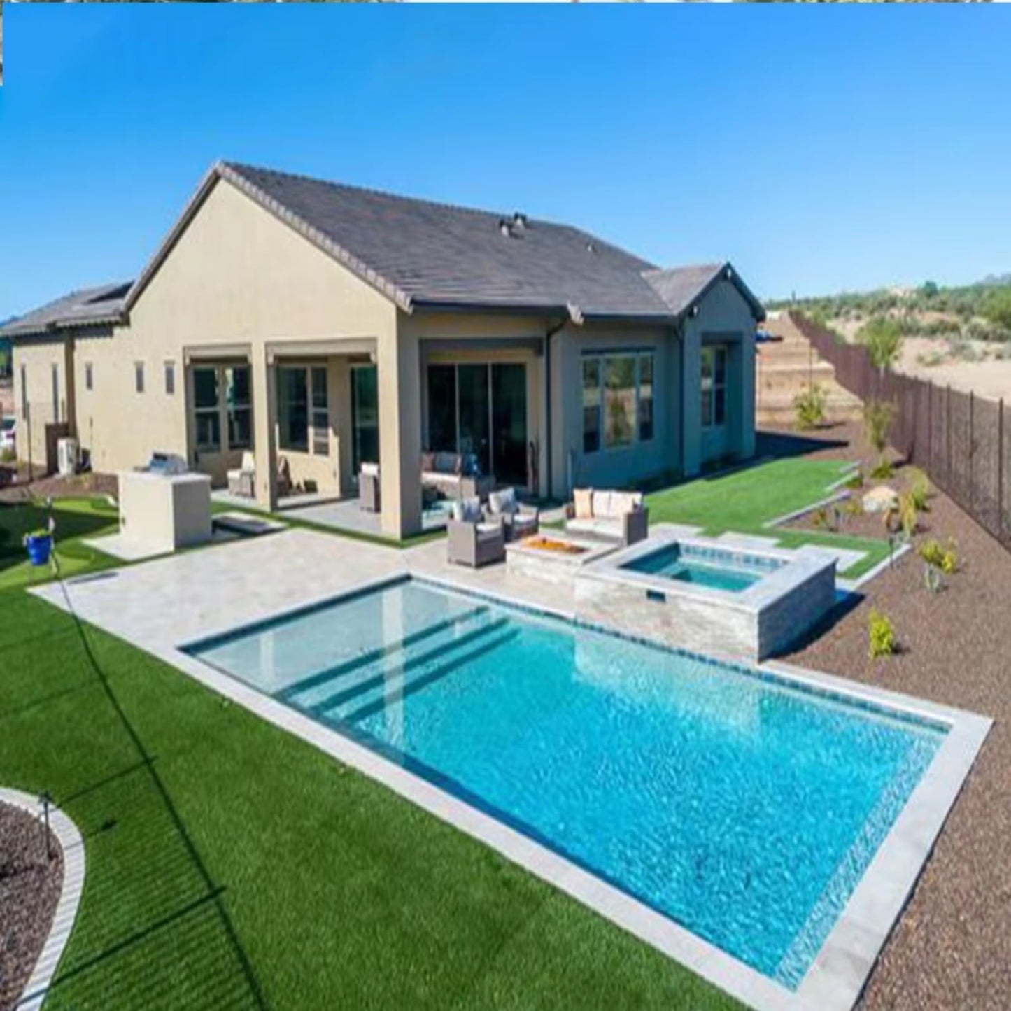 Modern luxury house with swimming pool, whirlpool, artificial turf & covered terrace