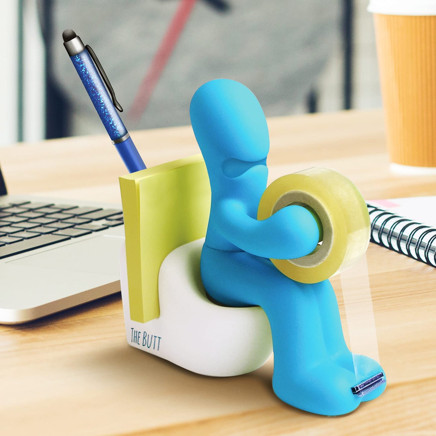 Desk organizer with adhesive tape dispenser, pen, paper clips and sticky notes